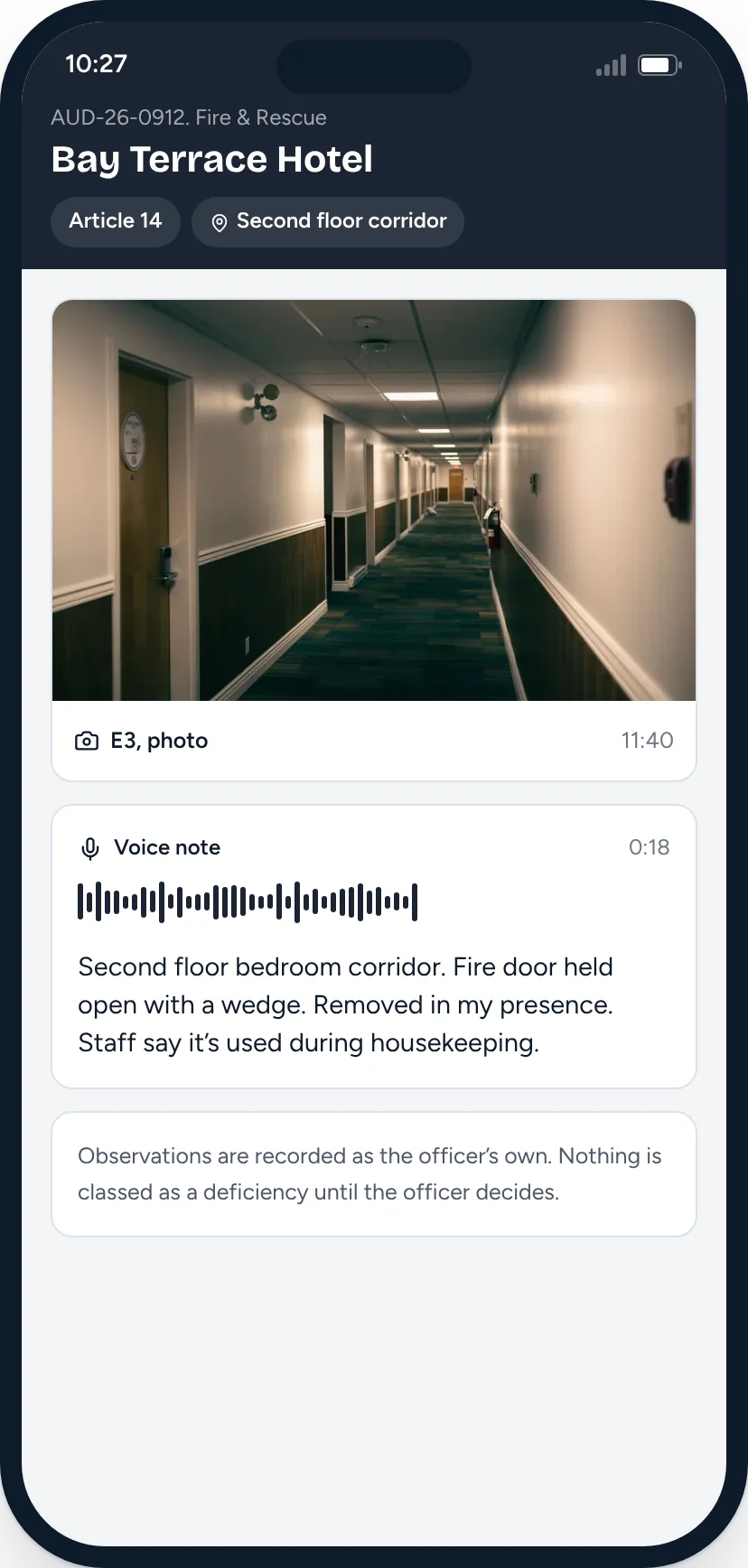 Officer capturing a photo and voice note against article 14 on a phone.