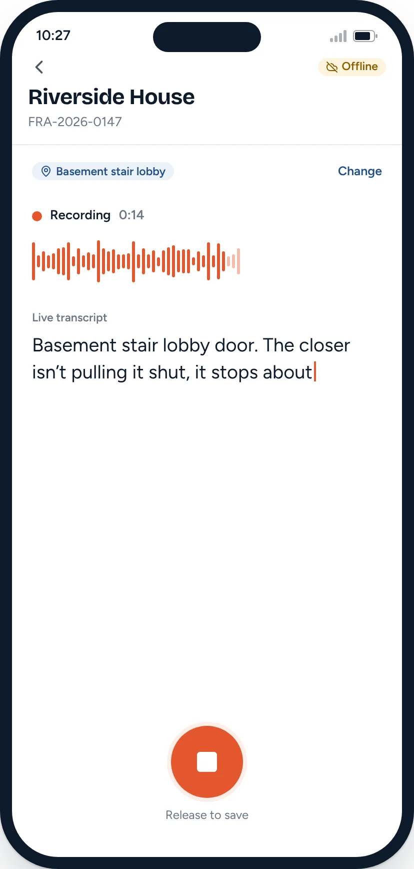 Recording a voice note in the basement stair lobby with a live transcript.